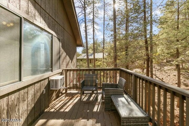 wooden deck with a wall mounted AC