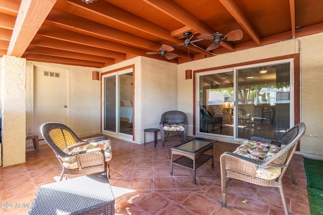 view of patio with ceiling fan