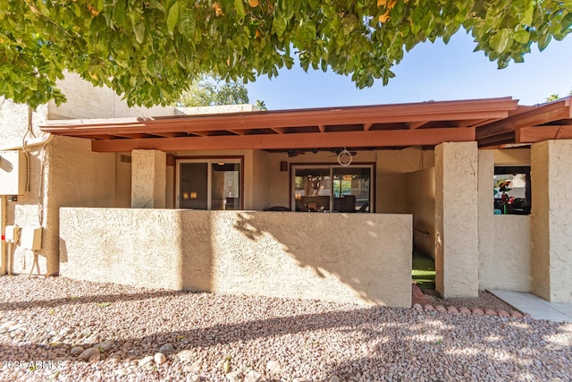 view of front of home featuring ceiling fan