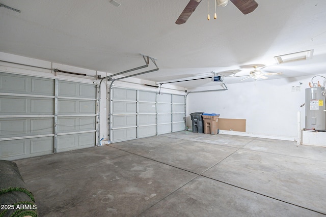 garage featuring a garage door opener, a ceiling fan, and electric water heater