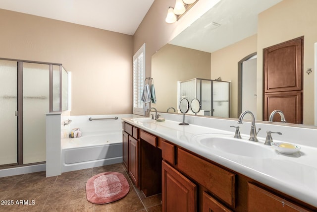 bathroom featuring vanity, tile patterned flooring, and separate shower and tub