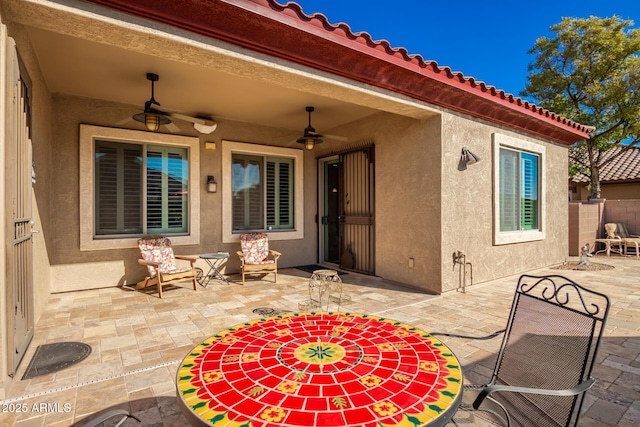 view of patio / terrace featuring ceiling fan