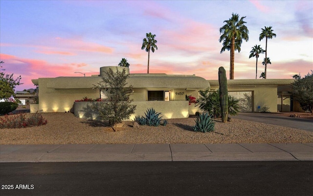 view of front of home featuring a garage