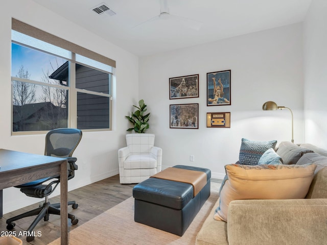 2882 W Presidio Dr, Flagstaff, AZ 86001 - office space with a ceiling fan, wood finished floors, visible vents, and baseboards