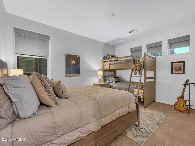 2882 W Presidio Dr, Flagstaff, AZ 86001 - bedroom with light carpet, baseboards, and visible vents