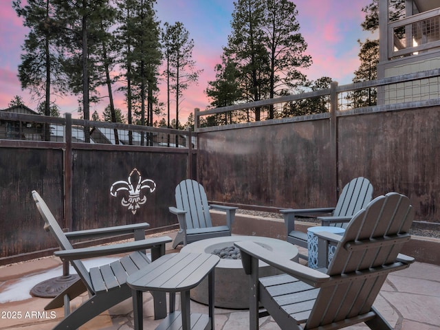 2882 W Presidio Dr, Flagstaff, AZ 86001 - view of patio / terrace with fence and a fire pit