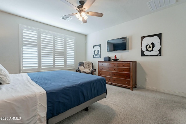 bedroom featuring light carpet and ceiling fan