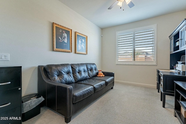 living room with ceiling fan and carpet floors