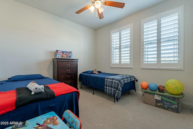 bedroom featuring carpet and ceiling fan