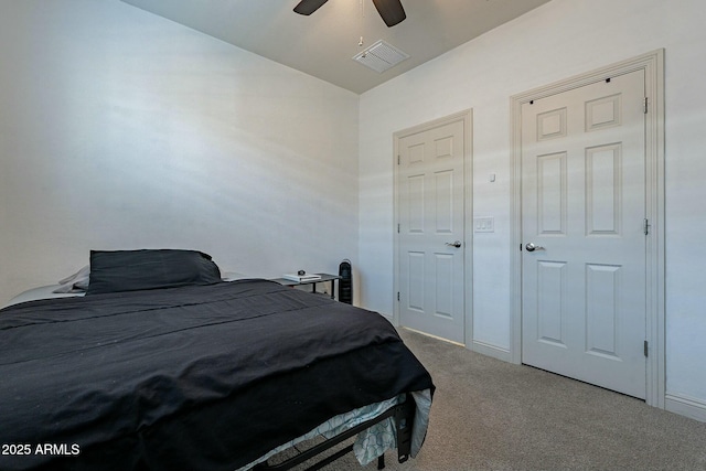 carpeted bedroom with lofted ceiling and ceiling fan