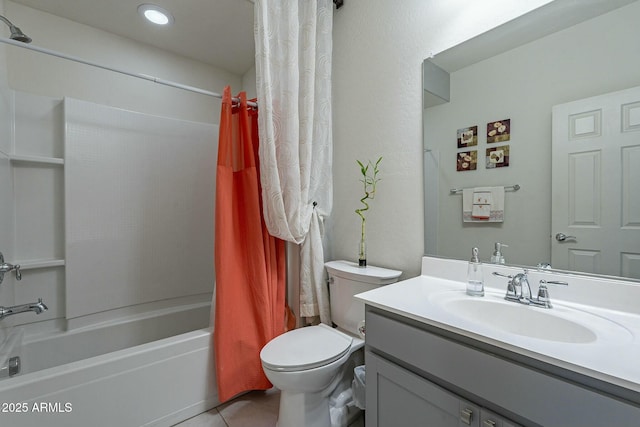 full bathroom featuring shower / tub combo, vanity, tile patterned flooring, and toilet