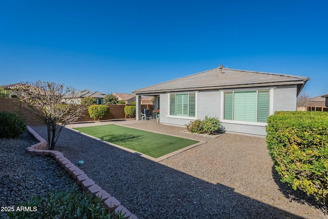 rear view of house with a patio area