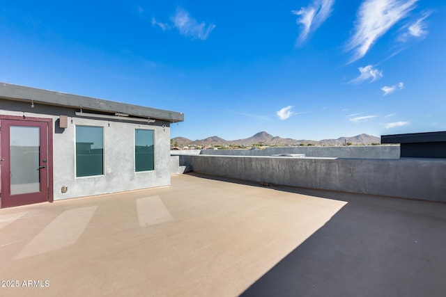 view of patio / terrace with a mountain view