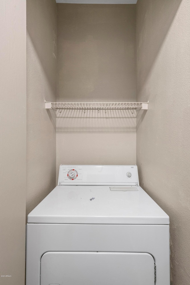 laundry area with washer / dryer