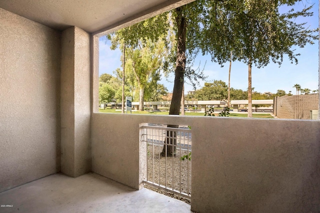 view of patio featuring a balcony