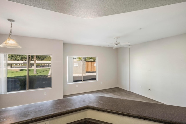 spare room with ceiling fan