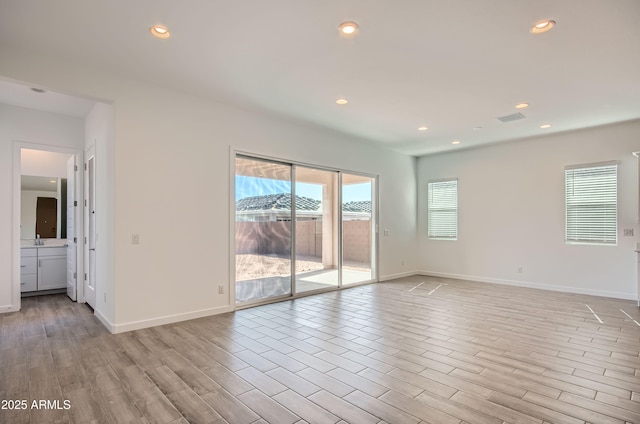 870 W Peralta Pass, Apache Junction, AZ 85120 - spare room featuring light wood-type flooring, recessed lighting, and baseboards