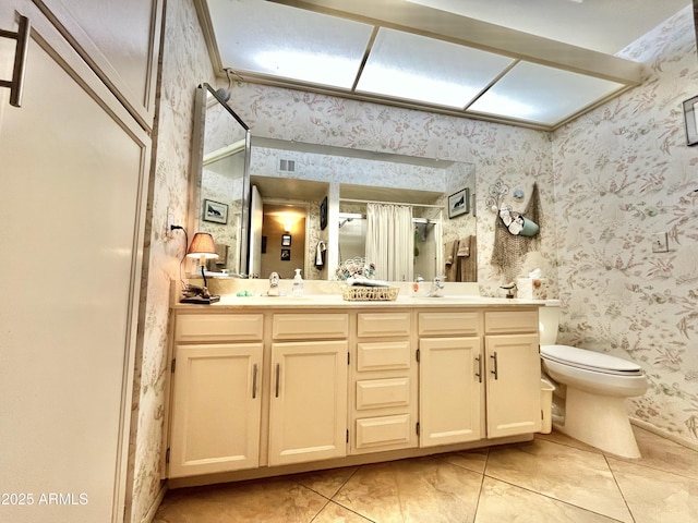 bathroom with toilet, vanity, a shower with curtain, and tile patterned flooring