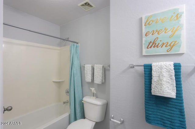 bathroom with toilet and shower / bathtub combination with curtain