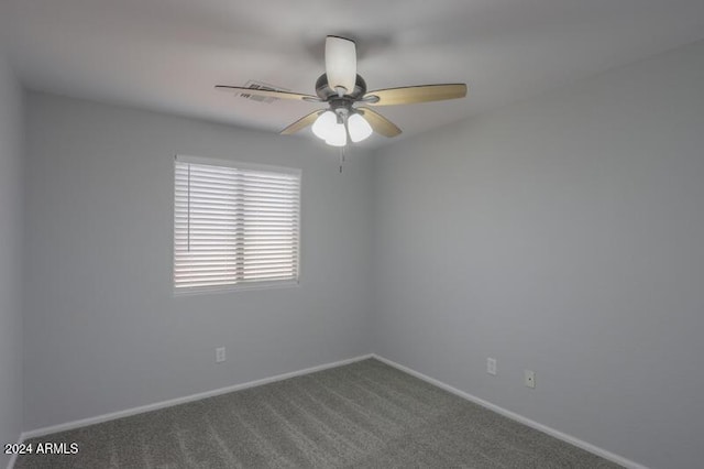 carpeted empty room with ceiling fan