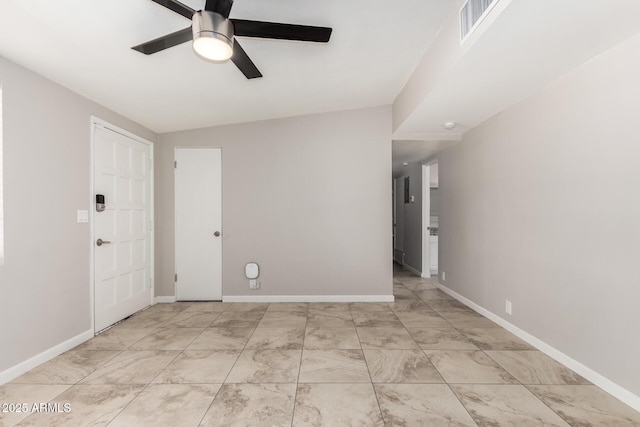 empty room featuring visible vents, baseboards, and ceiling fan