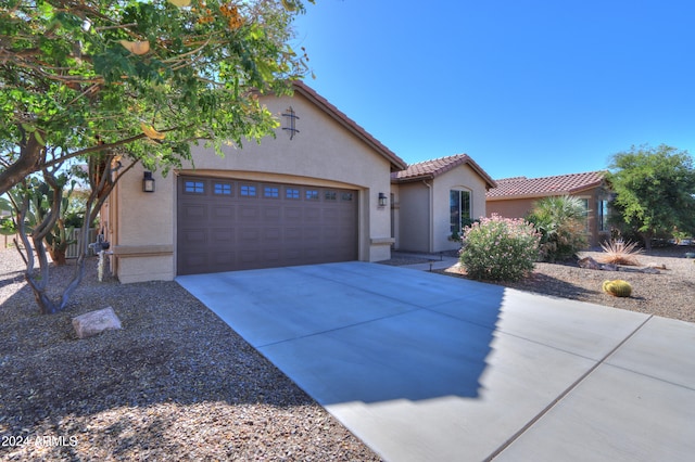 view of front of property with a garage