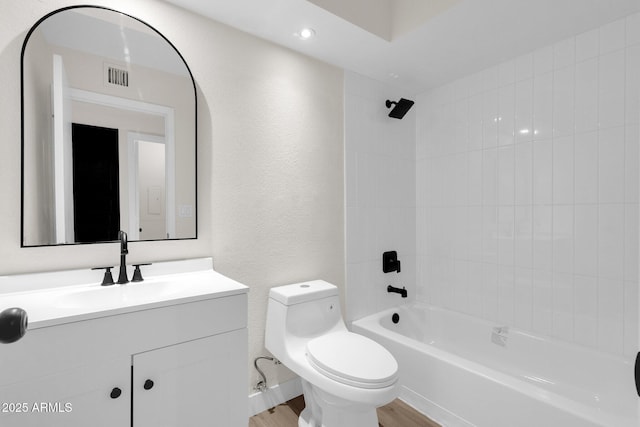 609 E Mesquite Cir Unit D132, Tempe, AZ 85288 - full bath with vanity, shower / tub combination, wood finished floors, and a textured wall