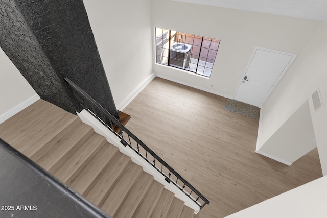 609 E Mesquite Cir Unit D132, Tempe, AZ 85288 - stairway with wood finished floors and baseboards