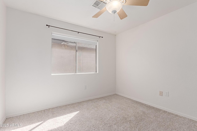 unfurnished room featuring visible vents, baseboards, a ceiling fan, and carpet floors