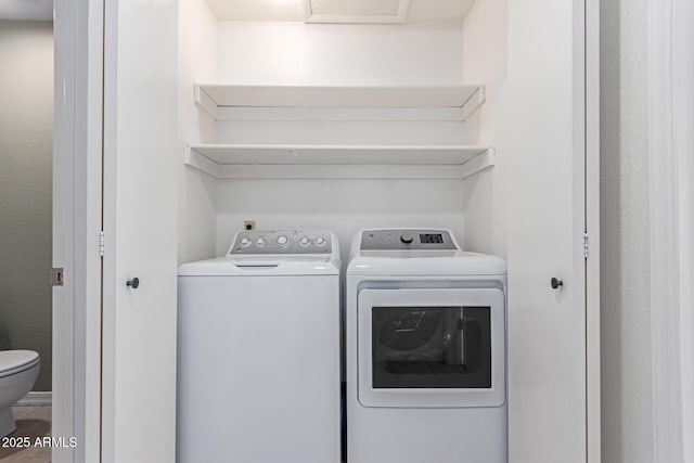 laundry room featuring laundry area and separate washer and dryer