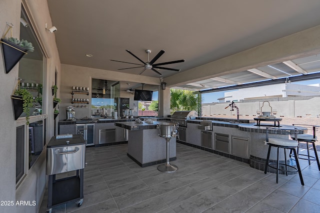 14332 E Bobwhite Way, Scottsdale, AZ 85262 - view of patio / terrace featuring exterior kitchen, ceiling fan, and wine cooler