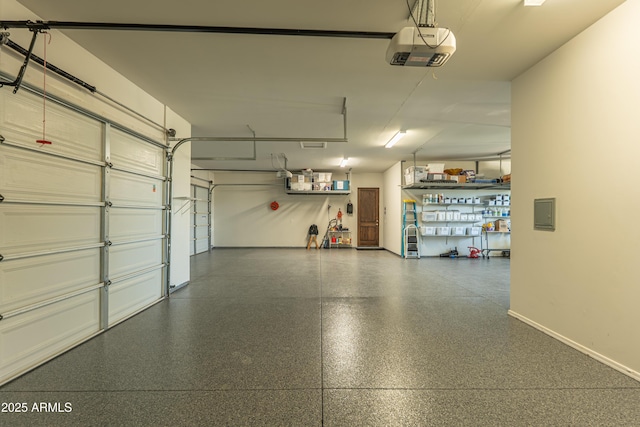14332 E Bobwhite Way, Scottsdale, AZ 85262 - garage with a garage door opener and baseboards