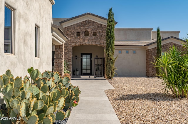 14332 E Bobwhite Way, Scottsdale, AZ 85262 - doorway to property with stucco siding and stone siding