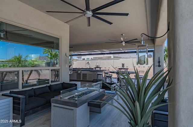 14332 E Bobwhite Way, Scottsdale, AZ 85262 - view of patio / terrace with ceiling fan and an outdoor living space with a fire pit