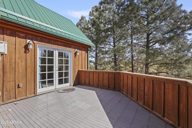 wooden deck featuring french doors