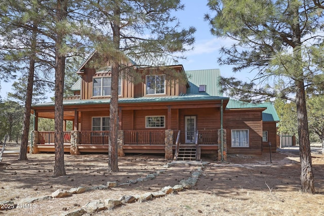 back of house with a porch