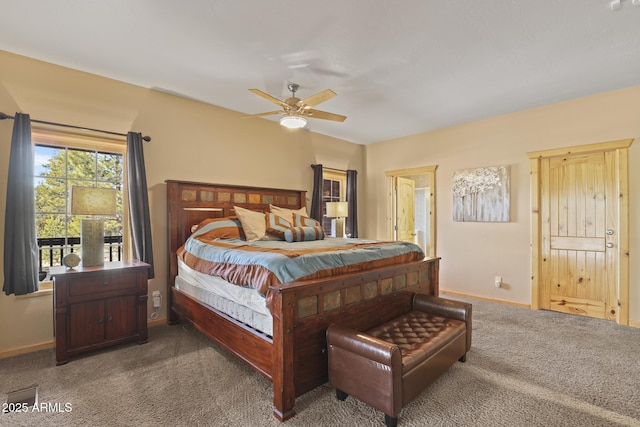 bedroom featuring ceiling fan, connected bathroom, and dark carpet