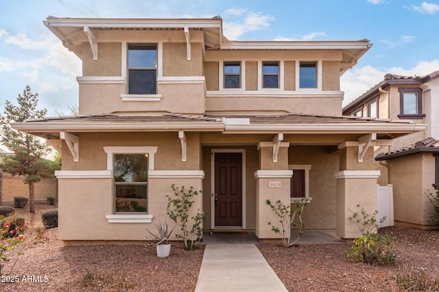 view of front facade featuring stucco siding