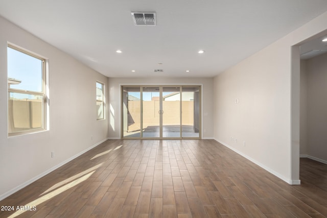 spare room with plenty of natural light