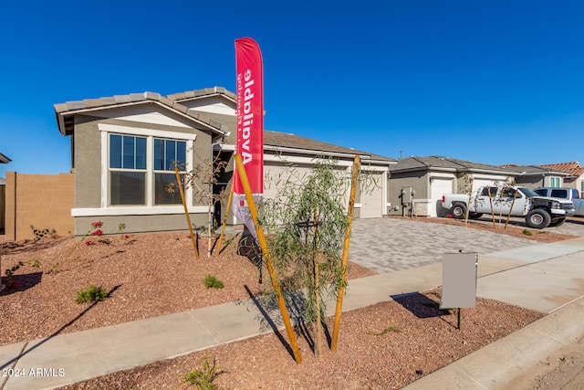 view of front of property featuring a garage