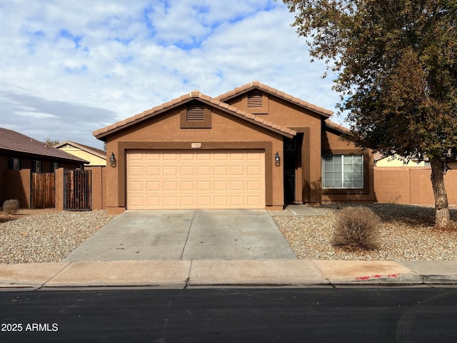 ranch-style house featuring a garage