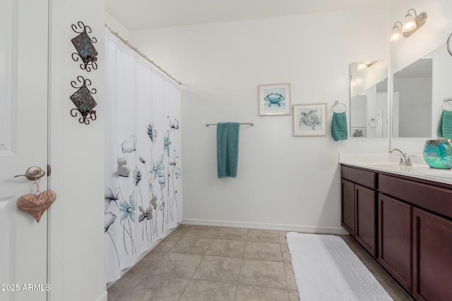 bathroom featuring tile patterned floors and vanity
