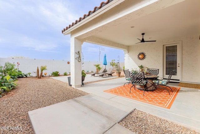 view of patio with ceiling fan