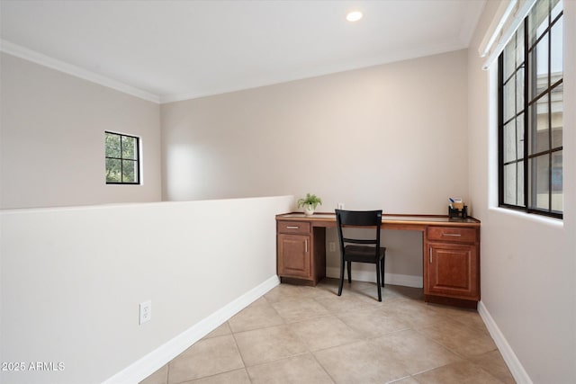 home office featuring light tile patterned floors and crown molding