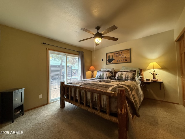 carpeted bedroom featuring access to outside, baseboards, and ceiling fan