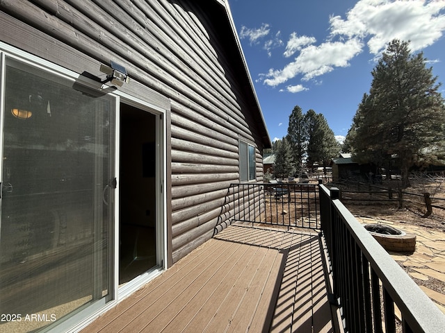 deck with an outdoor fire pit