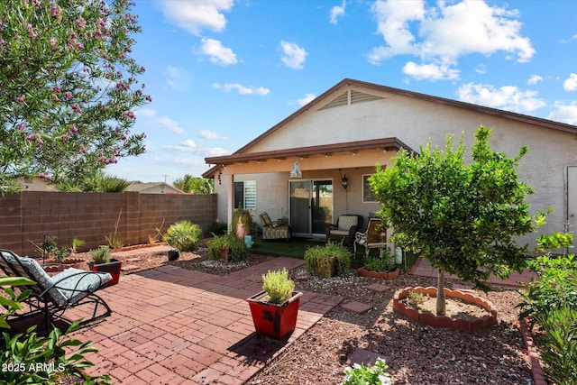 481 S San Marcos Dr, Apache Junction, AZ 85120 - rear view of house featuring stucco siding and a patio