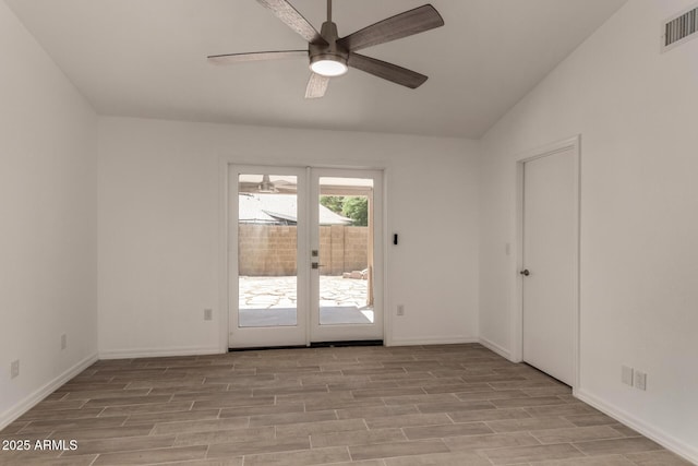 723 E Piute Ave, Phoenix, AZ 85024 - unfurnished room featuring light wood finished floors, a ceiling fan, vaulted ceiling, and french doors