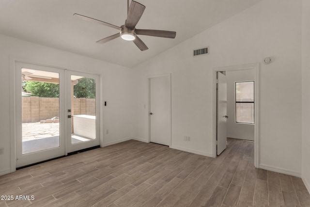 723 E Piute Ave, Phoenix, AZ 85024 - unfurnished room with lofted ceiling, light wood-style floors, ceiling fan, and french doors
