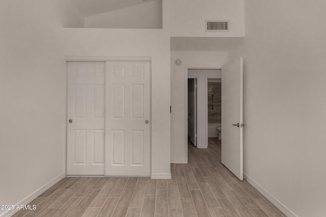 723 E Piute Ave, Phoenix, AZ 85024 - unfurnished bedroom with light wood-type flooring and a closet